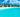 White villas and palm trees along the turquoise shoreline of Maundays Bay in Anguilla