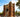 Arc de Triomf in Barcelona on a sunny day, with palm trees and local architecture near El Born.