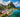 Aerial view of Soufrière and Petit Piton in Saint Lucia with turquoise water and boats along the coast